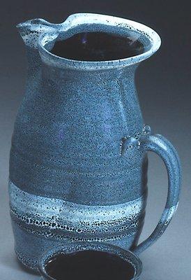 Blue Eagle Pottery available at Silver Bonsai Gallery, both in store and online.  https://silverbonsai.com/2-qt.-Pitcher.html