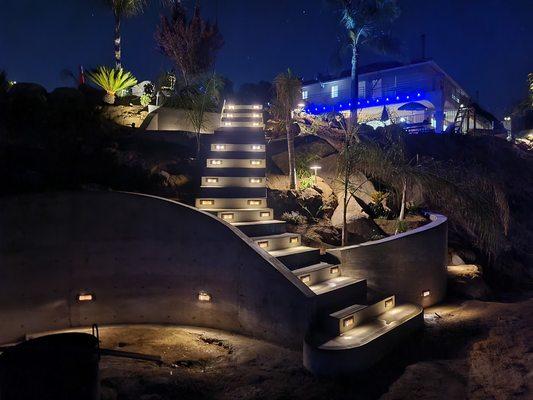 Night pictures of completed steps, radius walls and lighting.