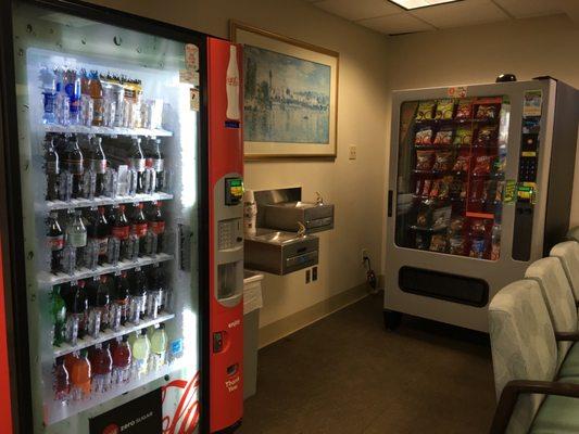 Vending machines sodas and water and snacks