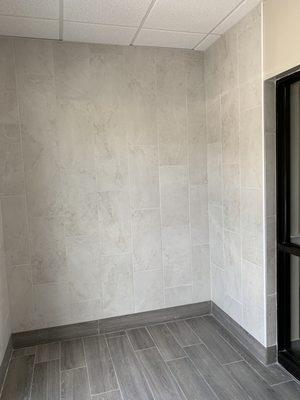 small vestibule - new floor and wall tile