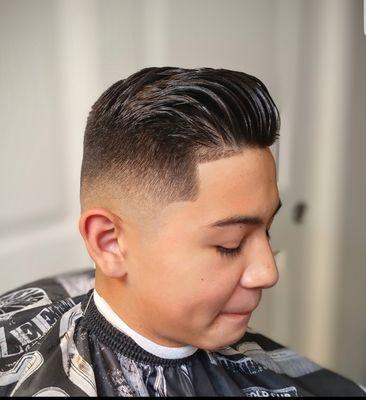 Comb over with skin fade.