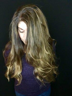 Deep golden blonde strands put in warmth into her Rich deep brown strands