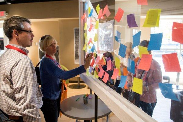 An attendee shares a story in one of the TEDxNaperville activity areas