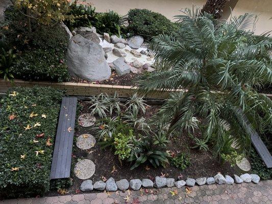 A lovely waterfall in the courtyard @ The Peninsula