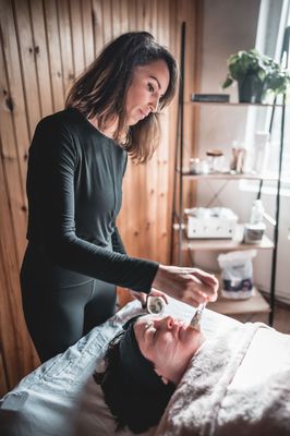 Co-Owner Abby giving a Facial in our in House Spa