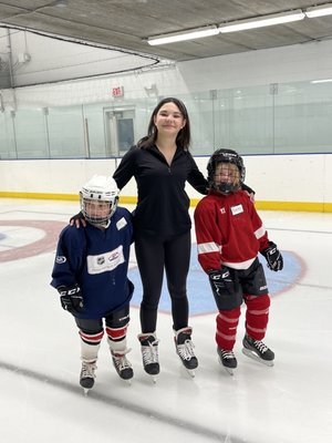 Rain and her hockey students.