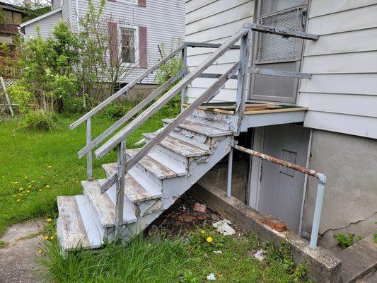 Old back porch. Small deck tore out