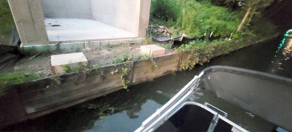 The pillars put in overnight, clearly closer than the permit shows, inches away from seawall