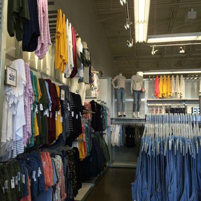 Wall of various clothing in the women's section.