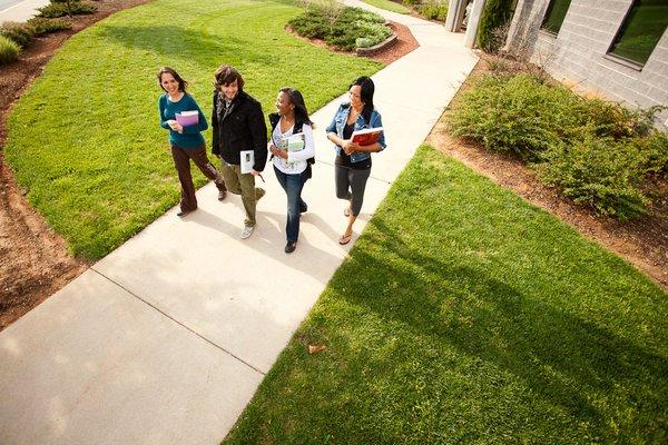 Students walking together on ACC's campus.