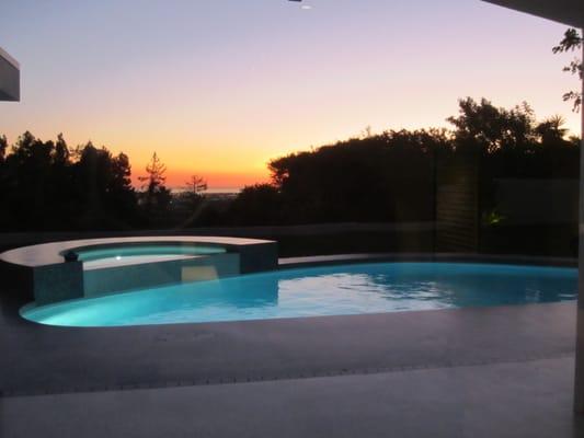 Mid century modern pool with terrazzo decks overlooking Beverly Hills