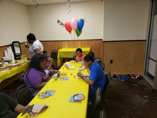 This is the third of the room. I believe the table set up probably could fit about 20 people. There was additional seating on the sides.