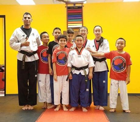 The Black Belt Club congratulating its newest black belt!