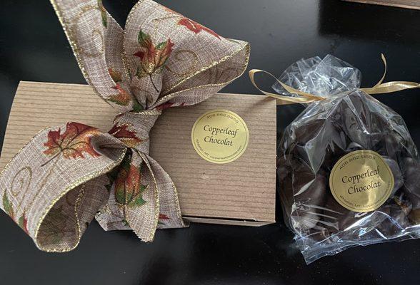 They tie their little gift boxes with the chocolates you choose and then tie the most exquisite ribbon around it!