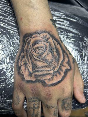 Tattoo rose on top of my hand!