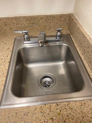 Sink with broken handle.