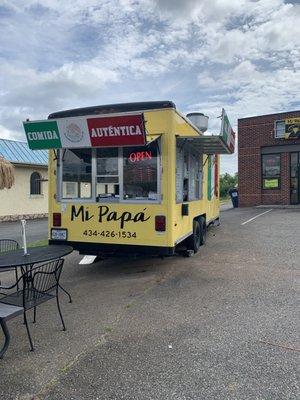 A taco truck or inside - incredible authentic Mexican food. A little of the red sauce will suffice for the right amount of heat.