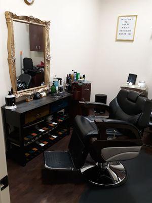 Sharp Men's Grooming Emporium features a luxurious oversize barber chair for your comfort.