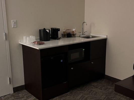 Wet bar with mini fridge, microwave & coffee maker