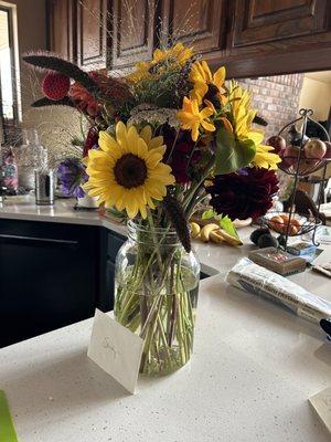 Order "happy" flowers for my MIL. Requested sunflowers and maroon colored flowers and I thought Kathy did a marvelous job.