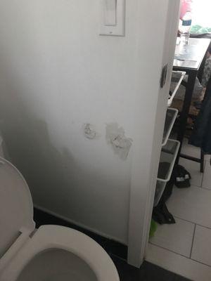 Holes in the wall that are poorly repaired