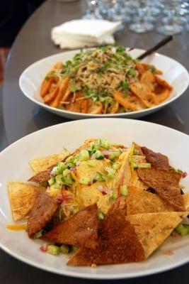 Hummus and roasted eggplant puree with marinated cucumbers and pita chips