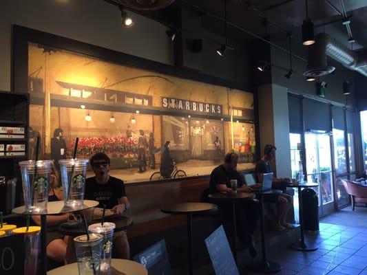 Cool Mural of The very first Starbucks in Seattle at Pike's Place market.