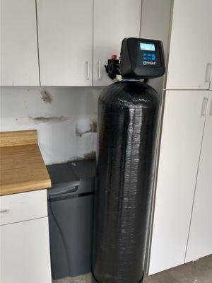 Iron filter and compact water softener.