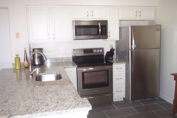 Kitchen upgrade included tile flooring, all new appliances, granite counter top and new cabinets.