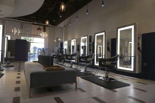 The chic salon interior and hair styling stations at W. Daly Aveda salon spa's luxurious Newnan Salon and Spa location.