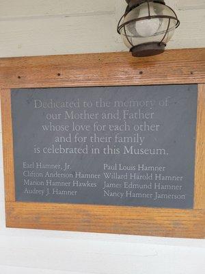 Dedication plaque on the front of the Hamner family home.