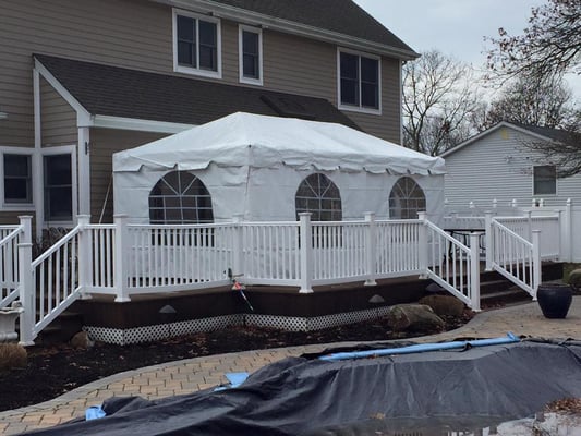 10x20 Frame Tent with Cathedral Window walls on a deck