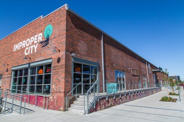 A brick building built by Symmetry Builders, a commercial general contractor based out of Dacono, CO.