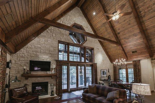 Dramatic vaulted ceiling, stone walls and bold timber beams make this Lawson home located in Yosemite the perfect mountain cabin getaway.