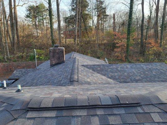 Again, ridge vents.  The top of our house looks so much better without those whirlybirds sticking out!