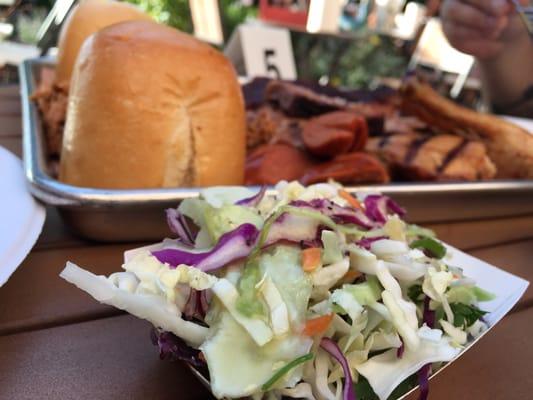 Sample platter side view. Cole slaw is bomb. Bread had this garlic flare to it. Meats... Woo boy, worth every penny (and more!)