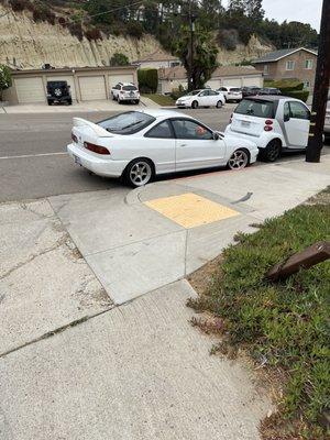 Construction employees park in fire lane on both sides of the driveway. Dangerous exiting due to oncoming traffic.