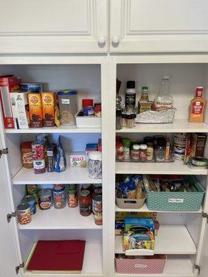 After pic of an organized pantry closet