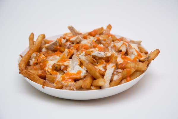 Our TBIRD FRIES!  French Fries with grilled chicken chunks, ranch dressing, wing sauce, baked with mozzarella cheese on top!