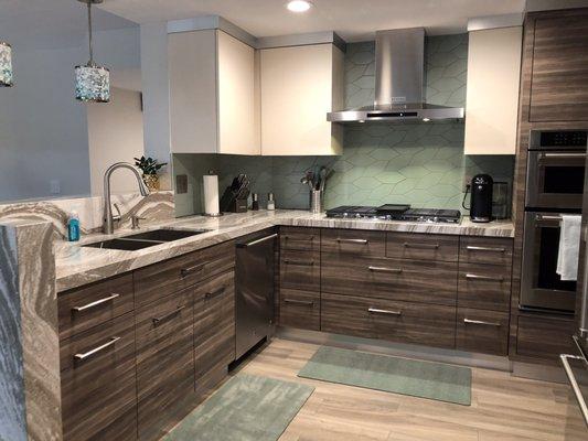 Custom kitchen including cabinets, countertops and fixtures by oakit