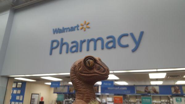 Bob the Raptor says "Pharmacy Mammals live here."