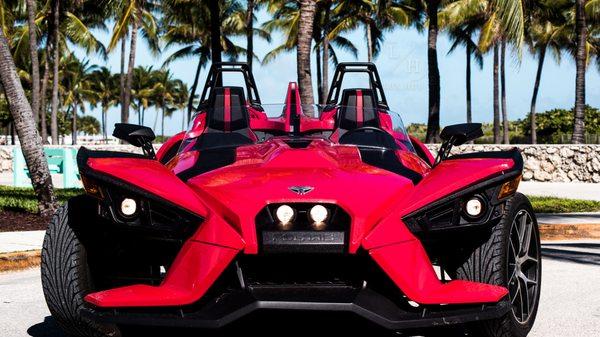 Red Polaris Slingshot 2021 on South Beach ocean drive