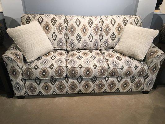 Justice Flare arm sofa with pillows