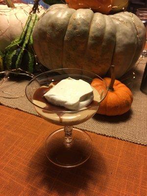 Italian Butterscotch Pudding with caramel sauce and whipped cream