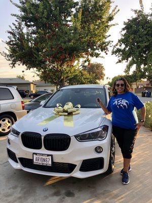 Posing next to my new beautiful; sporty, luxury car! All thanks to Nicole Dela Cruz