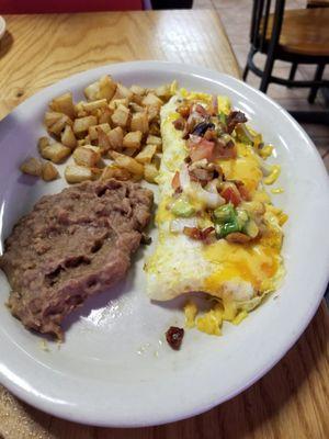 This a older pic I had this bfast plate called jalisco omelette.  Yes it's very good. U can ask without cheese or lil cheese.