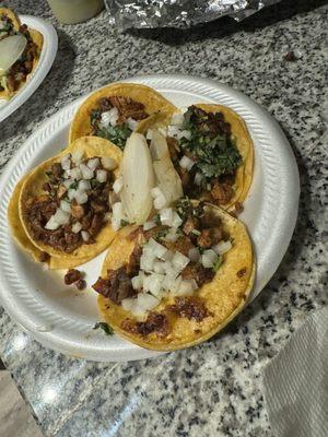 Al Pastor tacos on corn tortillas