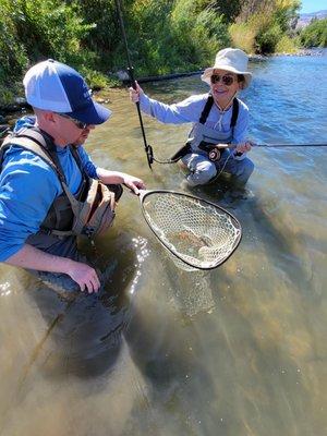 Jason our amazing guide helping to bring in our first catch!