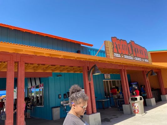 Food bar to left, bathrooms and lockers to the right