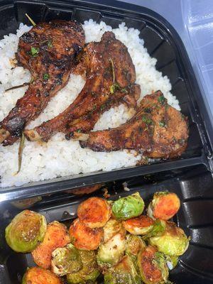 Lamb chops over white jasmine rice drizzled with our secret sauce.served with a side of Brussels or broccoli.